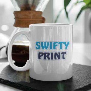 Ceramic mug on table top with swifty print logo printed on one side