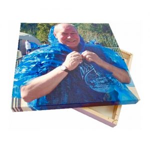 Canvas print of man in blue cape